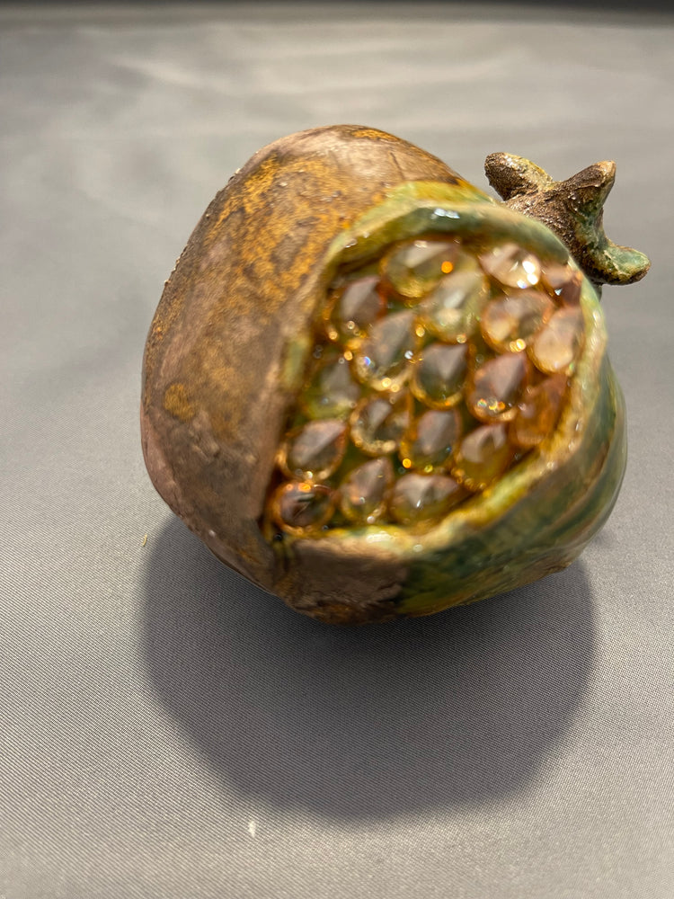 Pomegrade with Zirkon Stone